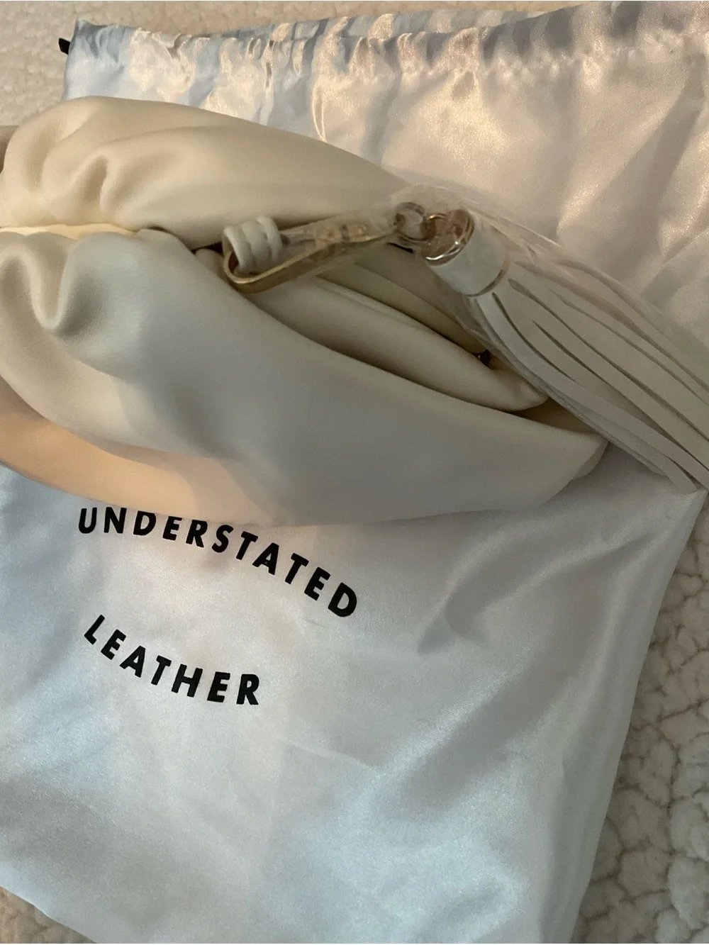 Understated Leather crescent cream